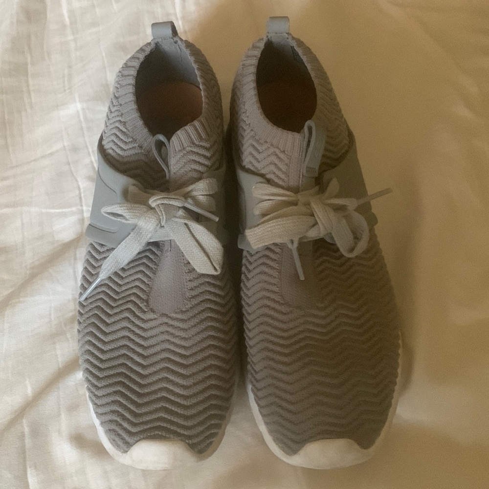 UGG brand slip on sneakers, size 8.